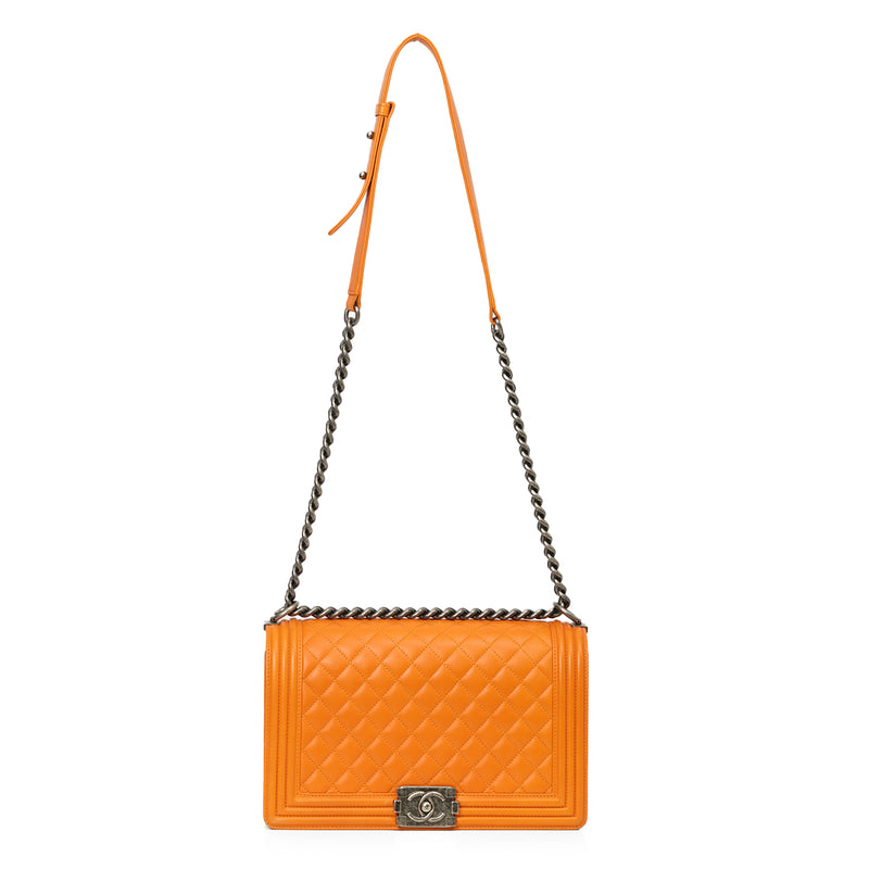 Women pre loved chanel boy orange quilted shoulder bag price
