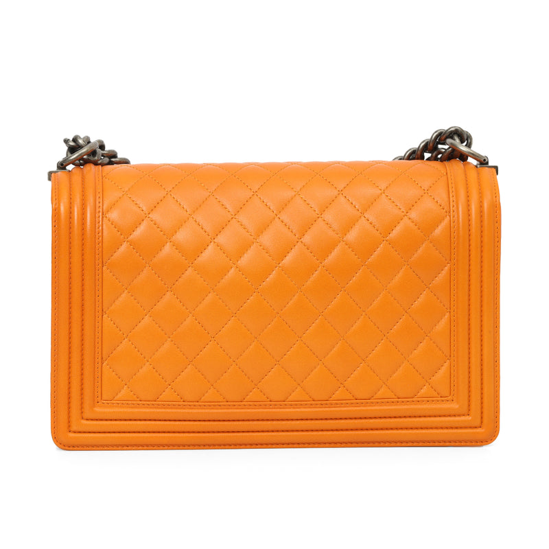 Women pre loved chanel boy orange quilted shoulder bag sale