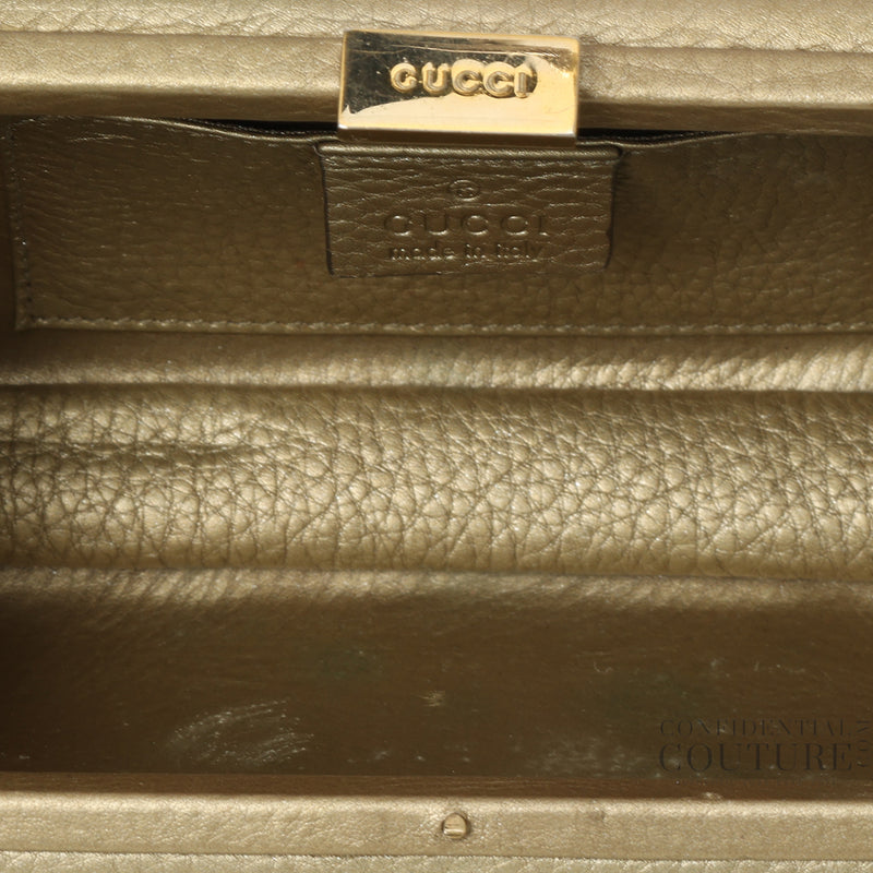 Pre-loved Gucci Gold Soho Hard Case Clutch Bag