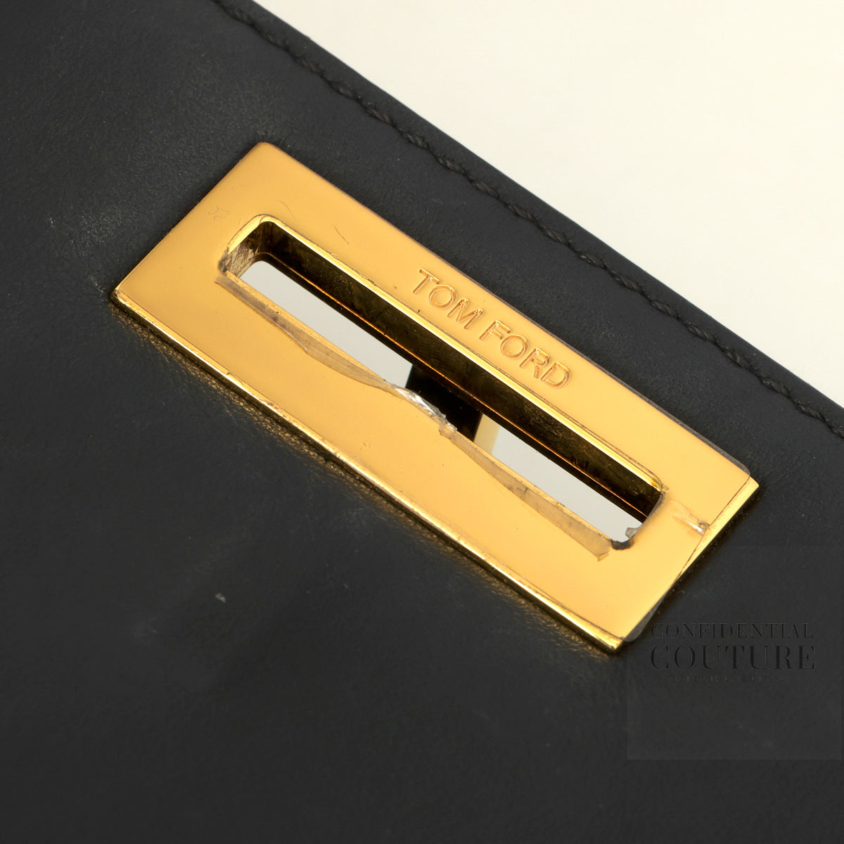 Cosmo small T Lock bag