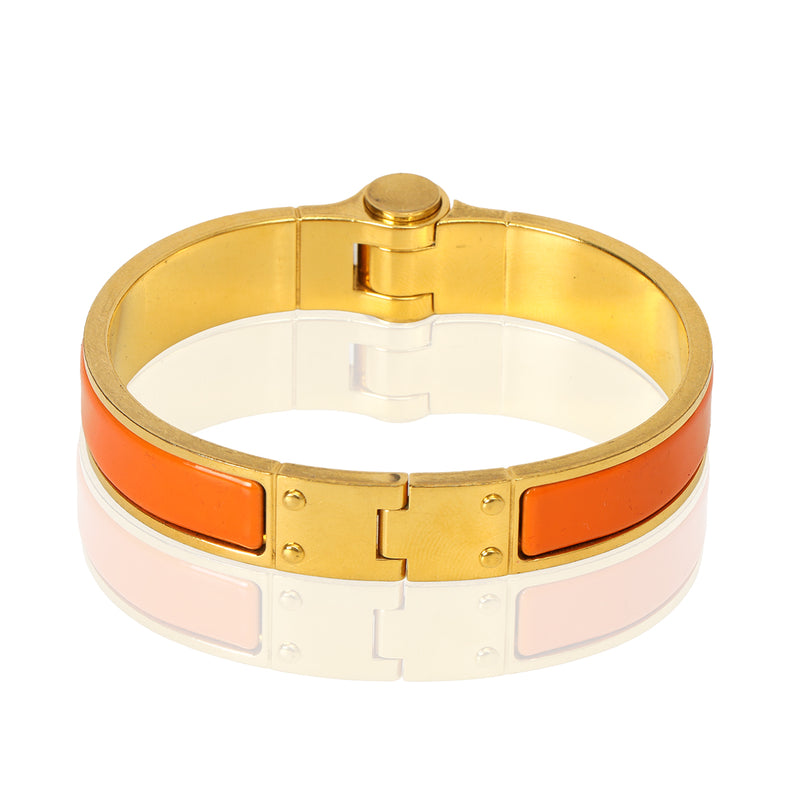 Pre-loved Hermes Narrow Hinged Orange Fruité Enamel Bracelet 15 cms
