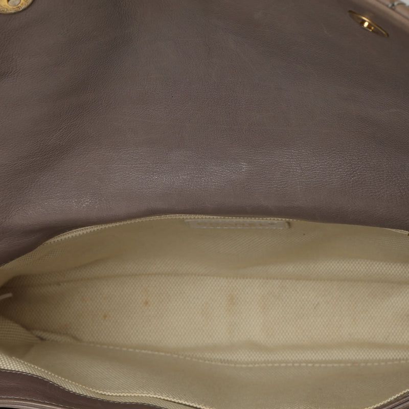 Women pre loved Chanel Maxi Leather Classic Flap Bag