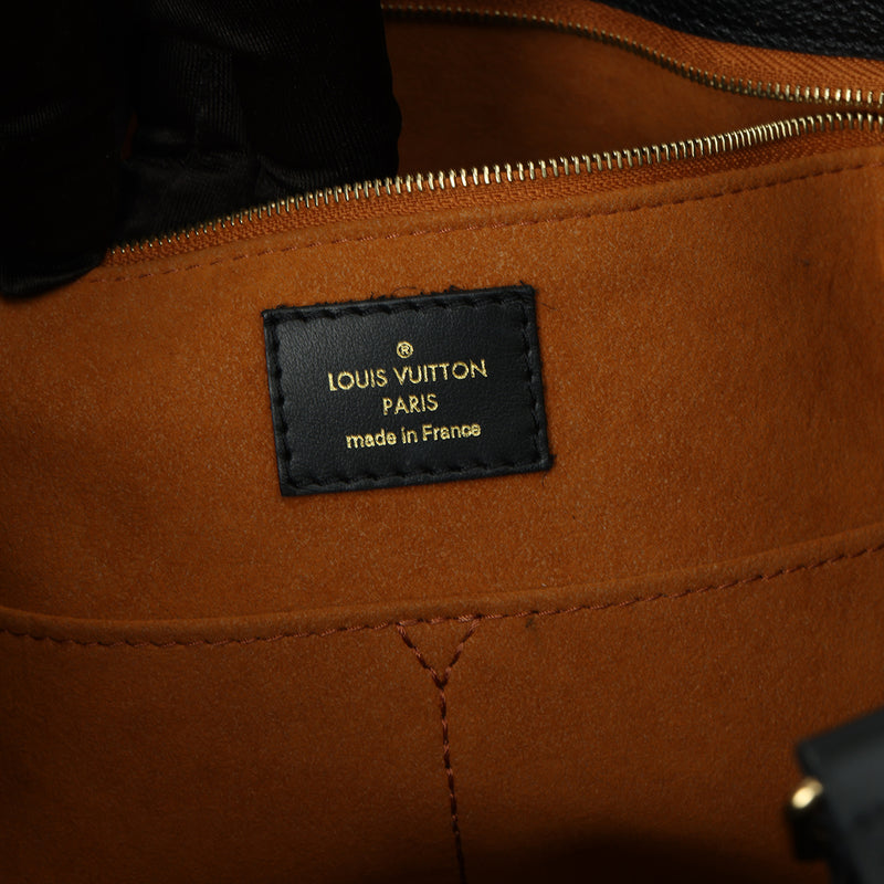 Second hand Louis Vuitton Black Monogram Empreinte OnTheGo MM Bag