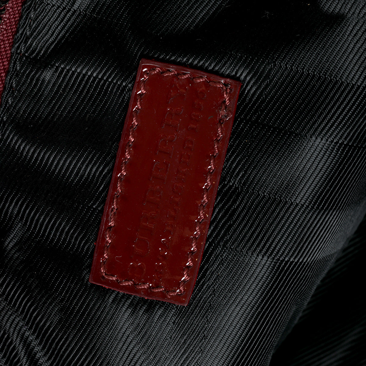 Maroon Prorsum Patent Leather Studded Clutch