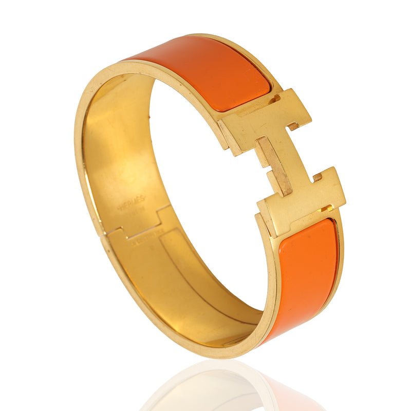 Pre-loved Hermes Clic Clac H Orange bracelet- Pm