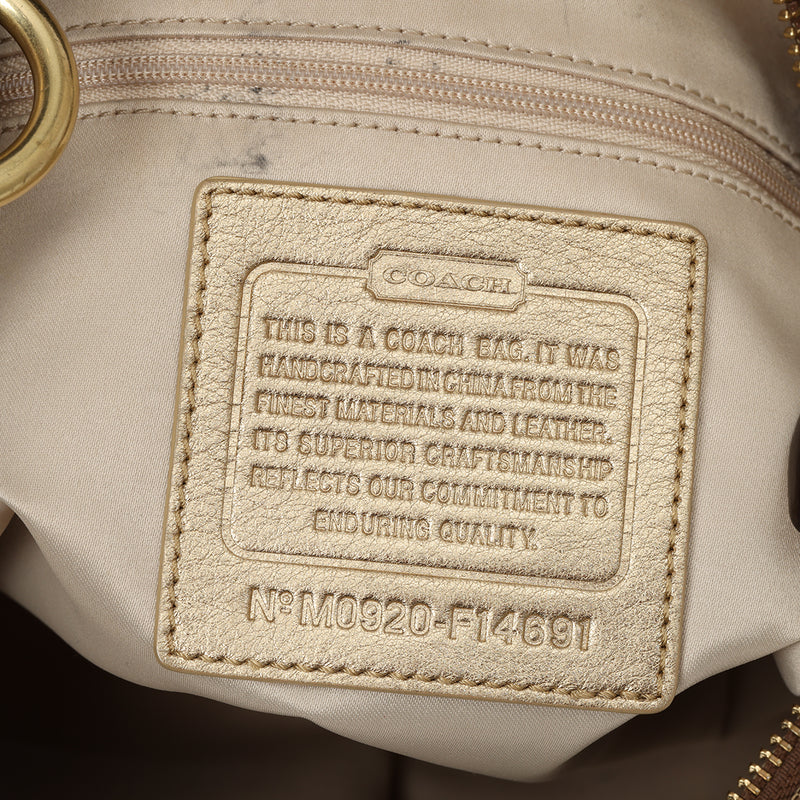 Women Coach Penelope Signature Hobo