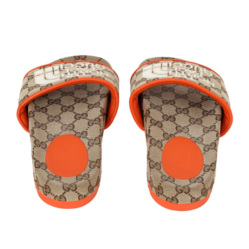 Pre-loved Gucci - X The North Face GG-Canvas Beige/Orange Slides- 37