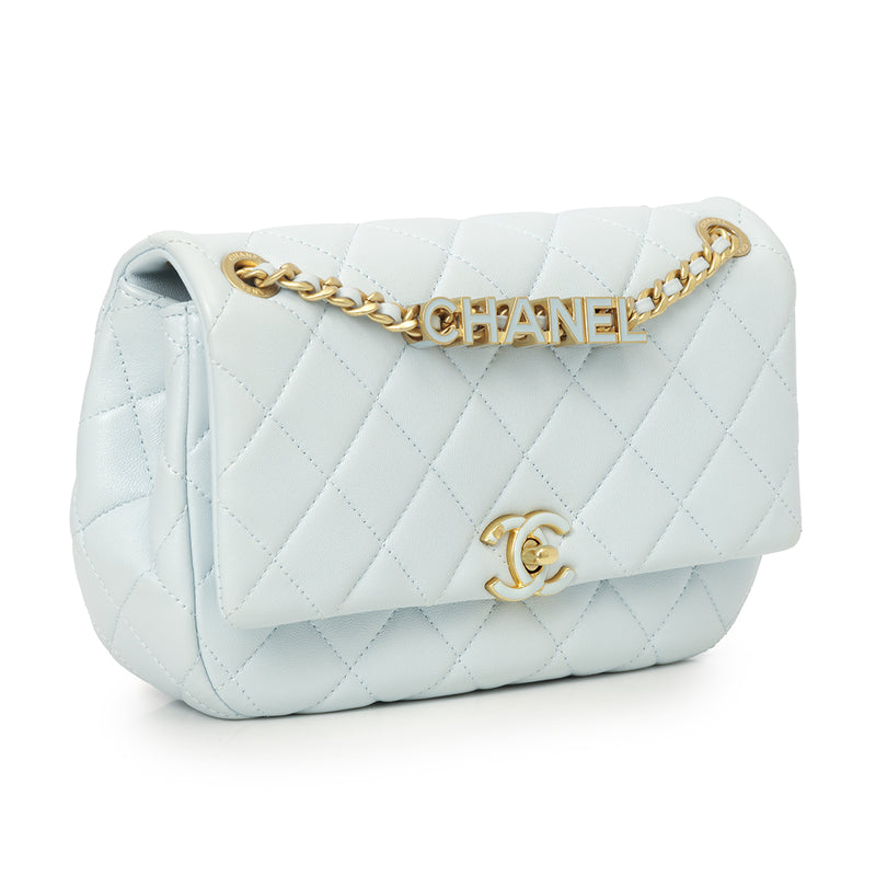 Pre loved chanel charm and logo flap bag one size