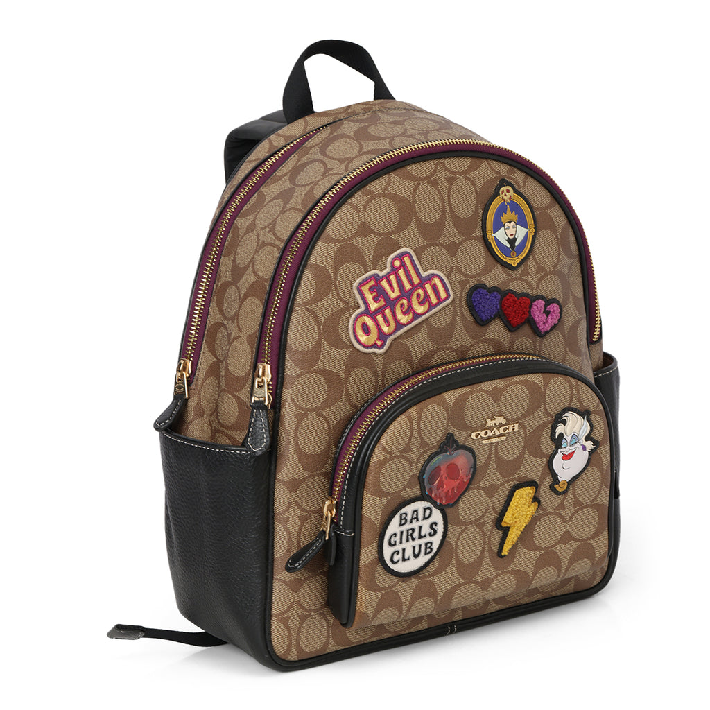 SHOP PRELOVED Coach x Disney Carrie Backpack 23 in Signature Canvas with Patches – 100% Authentic – Confidential Couture